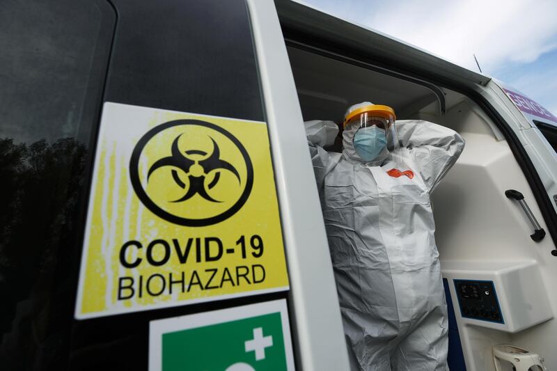 A medical personnel member waits for a dispatch in Peronnes-les-Binche, Belgium. Reuters