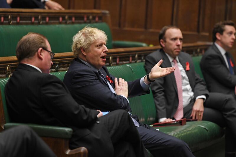 Britain's Prime Minister Boris Johnson speaks during a session on COVID-19 situation update at the House of Commons in London, Britain December 1, 2020.  UK Parliament/Jessica Taylor/Handout via REUTERS  THIS IMAGE HAS BEEN SUPPLIED BY A THIRD PARTY. MANDATORY CREDIT. IMAGE MUST NOT BE ALTERED