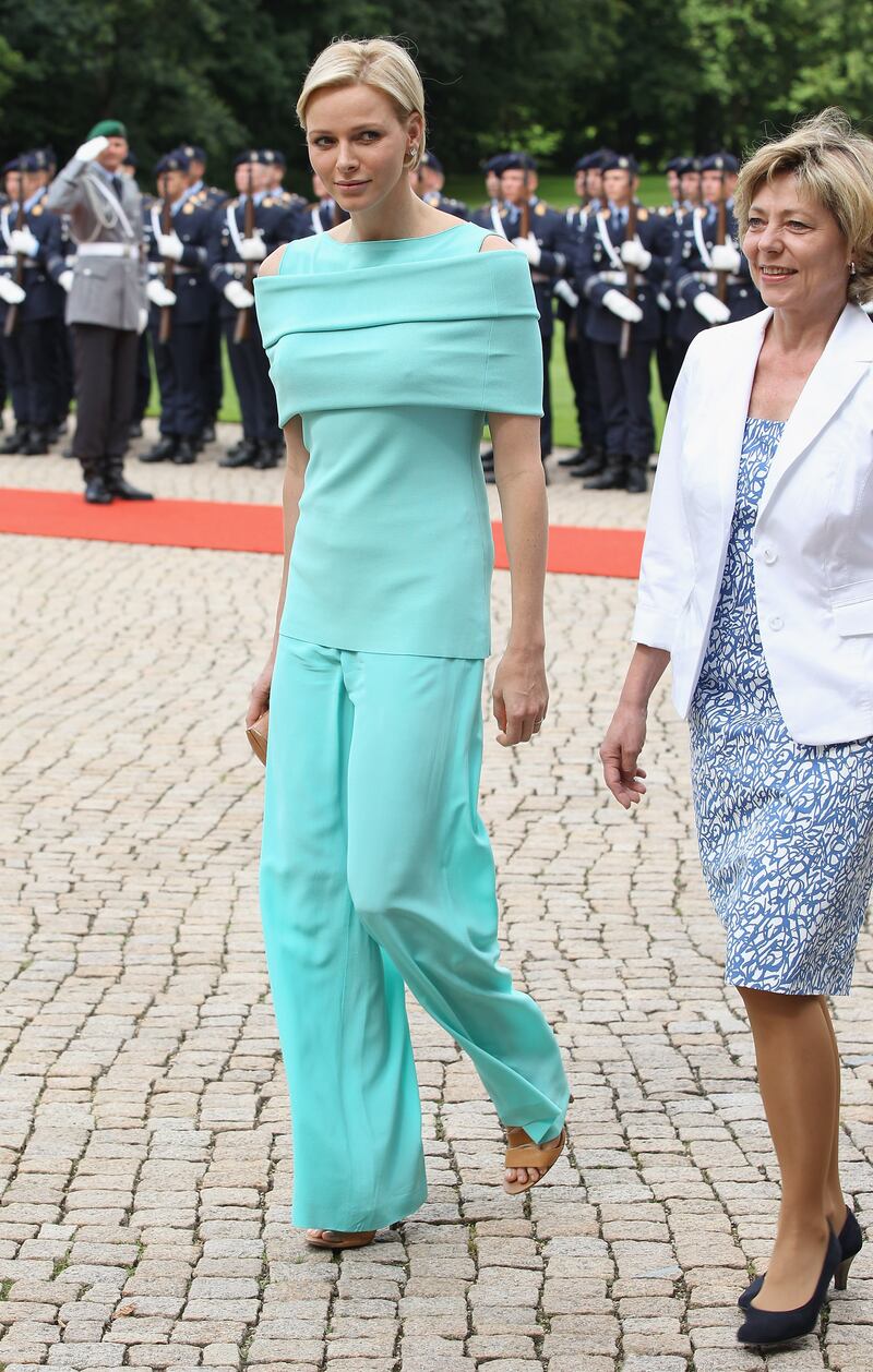 Princess Charlene, in a mint green jump suit,  visits Schloss Bellevue Palace in Berlin, Germany on July 9, 2012. Getty Images