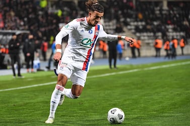 (FILES) In this file photo taken on December 17, 2021 Lyon's French defender Malo Gusto plays the ball during the French Cup round of 64 football match between Paris FC and Olympique Lyonnais (OL) at the Charlety stadium in Paris.  - Lyon's defender Malo Gusto has been transferred to English club Chelsea for 30 million euros and five million in bonuses over the duration of his contract signed until June 2030, OL announced on January 29, 2023.  (Photo by Bertrand GUAY  /  AFP)