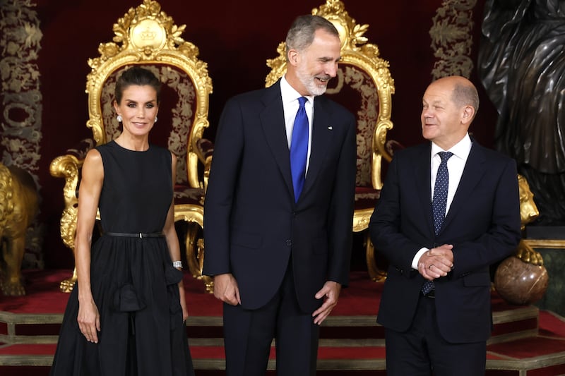 Spain's King Felipe VI and Queen Letizia greet German Chancellor Olaf Scholz, right, during a royal reception for heads of governments and states. EPA