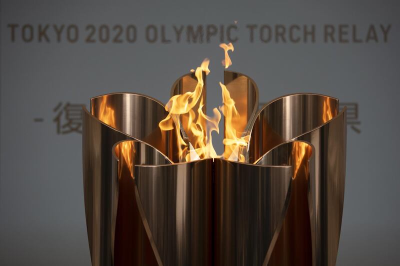 The Olympic Flame burns during a ceremony in Fukushima City, Japan. AP