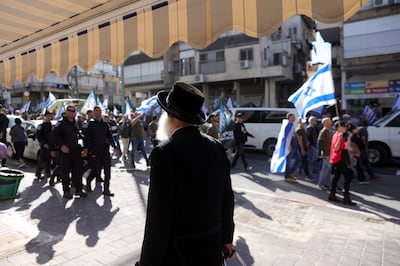 Protestors descended on the ultra-Orthodox city of Bnei Brak, sparking bitter counter demonstrations from the deeply conservative community. EPA