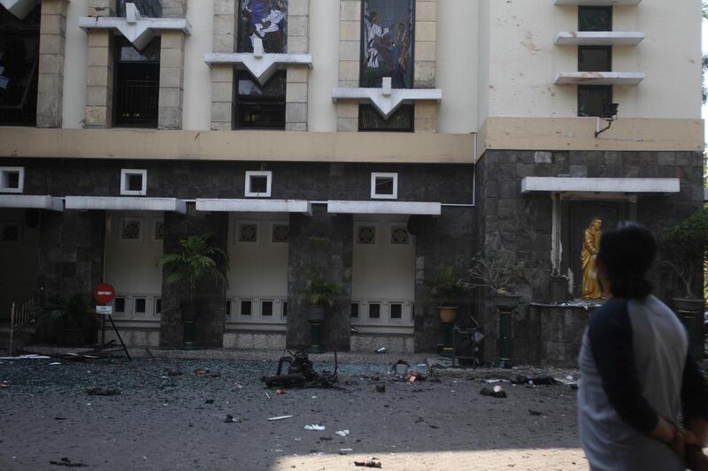 Debris is seen at a church where an explosion went off in Surabaya, East Java, Indonesia. Trisnadi / AP Photo