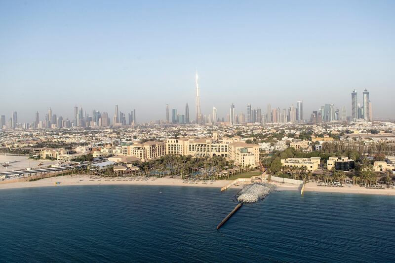 DUBAI, UNITED ARAB EMIRATES, JUNE 14, 2015. Dubai's skyline. Photographer: Reem Mohammed / The National *** Local Caption ***  RM_20150614_HELI_031.JPG