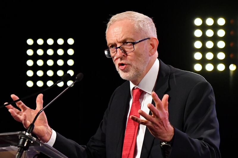 FILE - In this Thursday, Oct. 19, 2017 file photo, Britain's Labour Party leader Jeremy Corbyn delivers a speech prior to a meeting of European Socialists prior to an EU summit in Brussels. The leader of Britain's opposition Labour Party has said on Tuesday, Feb. 20, 2018 a claim that he gave information to a Czechoslovak spy during the Cold War is "a ridiculous smear." Jeremy Corbyn says claims in British newspapers "are increasingly wild and entirely false." (AP Photo/Geert Vanden Wijngaert, file)