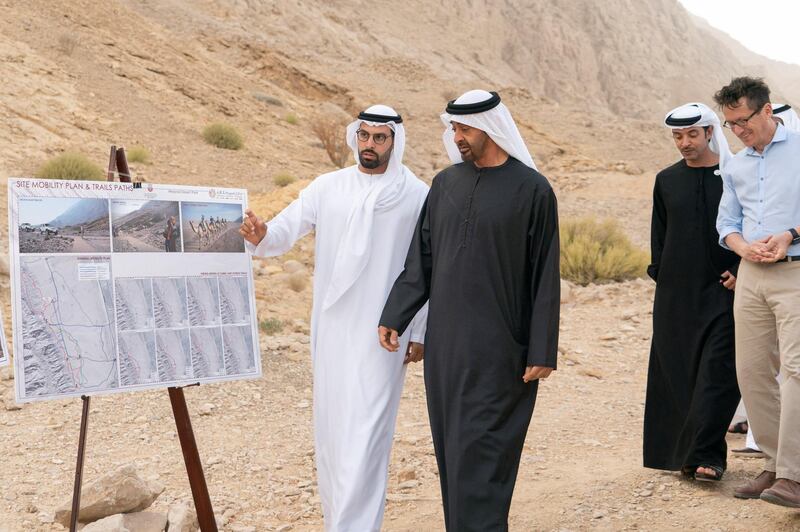 AL AIN, UNITED ARAB EMIRATES - January 19, 2019: HH Sheikh Mohamed bin Zayed Al Nahyan, Crown Prince of Abu Dhabi and Deputy Supreme Commander of the UAE Armed Forces (2nd L) and HH Sheikh Hazza bin Zayed Al Nahyan, Vice Chairman of the Abu Dhabi Executive Council (3rd L) inspect Jebel Hafeet tombs. Seen with HE Mohamed Khalifa Al Mubarak, Chairman of the Department of Culture and Tourism and Abu Dhabi Executive Council Member (L) and Dr Peter Magee, Head of Archaeology at the Department of Culture and Tourism Abu Dhabi (R).

( Rashed Al Mansoori / Ministry of Presidential Affairs )
---