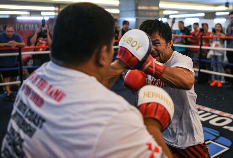 Manny Pacquiao takes part in a training session at a gym in Kuala Lumpur ahead of his WBA world welterweight bout against Argentina's Lucas Matthysse on July 15.  AFP