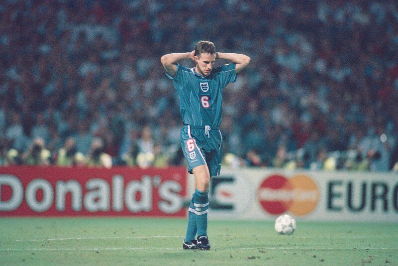 Gareth Southgate reacts after missing a penalty in the Euro 96 semi-final against Germany, which saw England knocked out of the tournament.