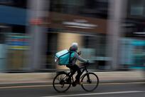 Deliveroo, Just Eat and Uber Eats agree to extra checks to tackle illegal working in UK