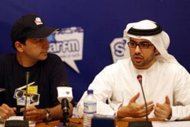 Karim Sarkis, left,  and Abdulrahman Awadh al Harthi at the launch of Abu Dhabi Media Company's new radio station Star FM.