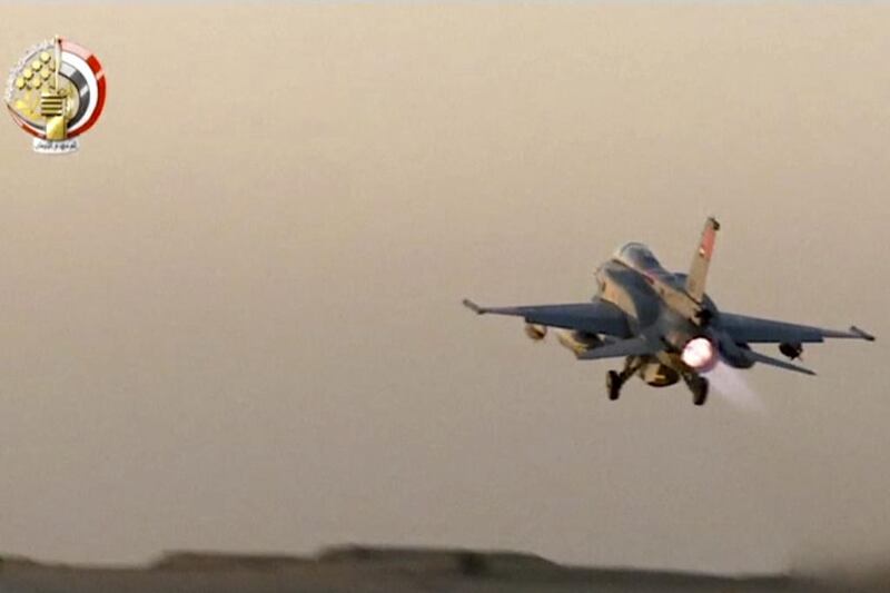 An Egyptian fighter jet takes off from an undisclosed location in Egypt to strike militant camps in the Libyan city of Derna on May 26, 2017. Egyptian military via AP