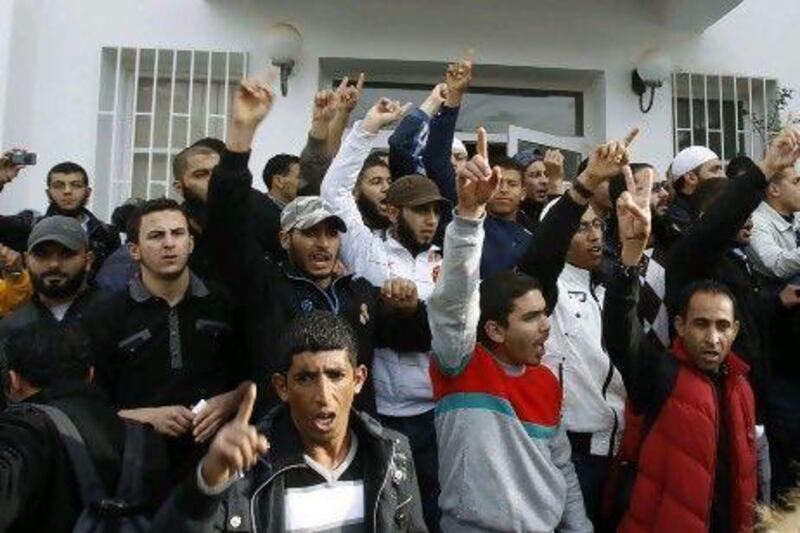 Salafist students shout ‘Allah hu Akbar’ during a protest at the humanities and literature faculty in Manouba University, near Tunis.  Their protest to demand the right for women to wear veils during examinations turned violent as they clashed with secular students.