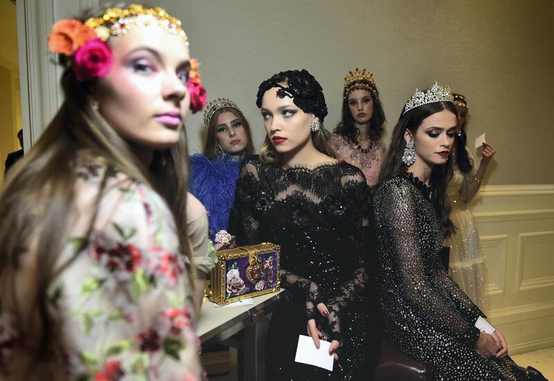 Models patiently wait for their moment in the spotlight. Courtesy Mark Ganzon