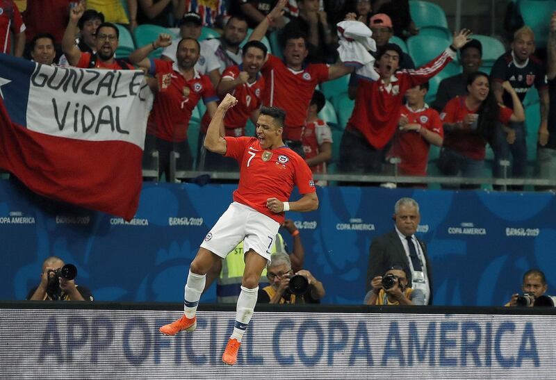 Alexis Sanchez celebrates after scoring for Chile against Ecuador. EPA