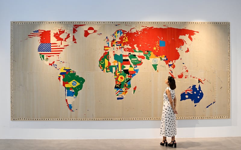 An embroidered map valued at $12 million displayed at Sotheby's Dubai. Getty