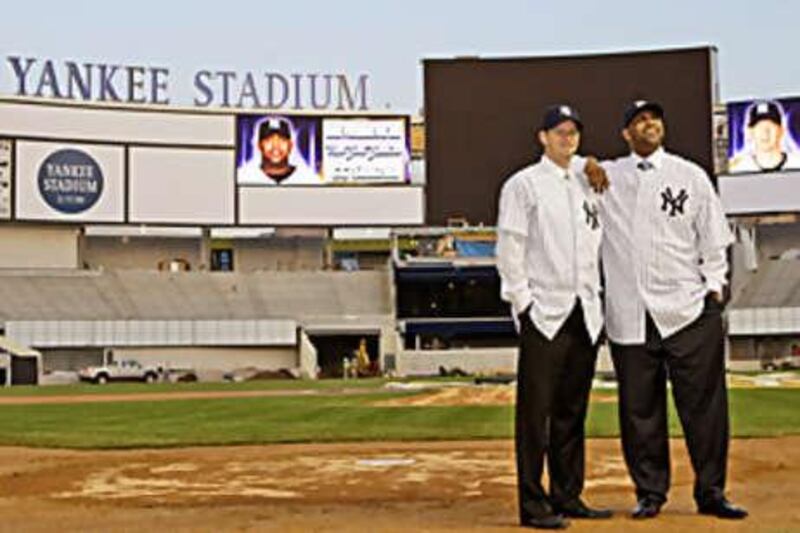 The big money signings AJ Burnett, left, and CC Sabathia at the new Yankee Stadium.