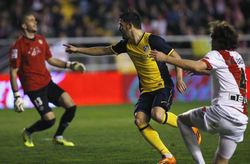 David Villa scored Atletico Madrid's opening goal on Sunday night. Juan Medina / Reuters
