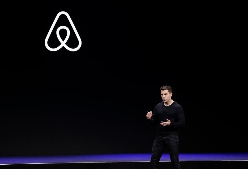 FILE - In this Feb. 22, 2018, file photo Airbnb co-founder and CEO Brian Chesky speaks during an event in San Francisco.   Airbnb is laying off 25% of its workforce as it confronts a steep decline in global travel due to the new coronavirus. In a letter to employees, Tuesday, May 5, 2020, Chesky said the company is letting 1,900 of its 7,500 workers go and cutting businesses that donâ€™t directly support home-sharing, like its investments in hotels and movie production.(AP Photo/Eric Risberg, File)