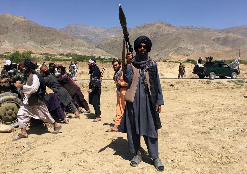 A Taliban fighter brandishes a rocket-propelled grenade launcher in Panjshir province, north-eastern Afghanistan. AP Photo