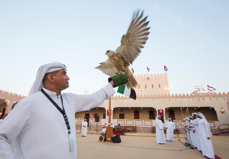 AL WATHBA, UNITED ARAB EMIRATES- Falconry is one of the oldest Emirati tradition at Abu Dhabi Culture and Tourism pavilion at Sheikh Zayed Heritage.  Leslie Pableo for The National