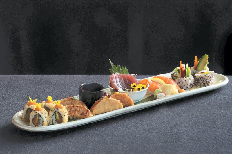 Dubai, United Arab Emirates - May 13, 2019: Iftar Signature Dish. The Oni Iftar signature platter from Oni at the Shangri La hotel. Monday the 13th of May 2019. Downtown, Dubai. Chris Whiteoak / The National

Chefs description: Organic chicken gyoza, chefs sushi selection, and aromatic salmon taco. A mix of Oni signature dishes in one plate, giving the guest an experience of contemporary Japanese Iftar.