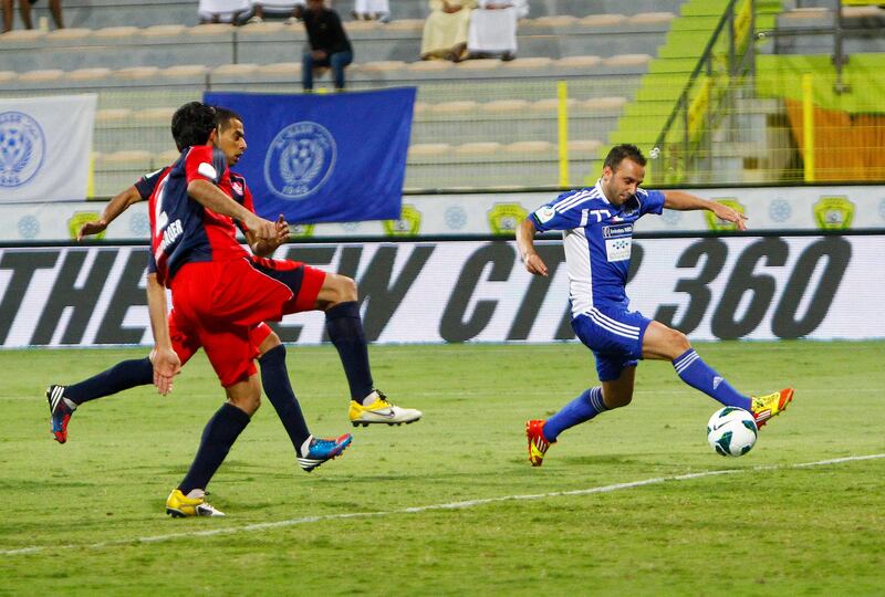 Mascara Giuseppe of Al Nasr scores his side's first goal during the Etisalat Pro League match between Al Nasr and Al Shaab at Zabeel Stadium, Dubai on the 3rd November 2012. Credit: Jake Badger for The National