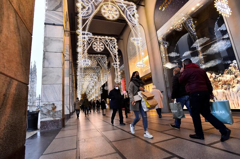 People go shopping in Milan, Italy. Reuters