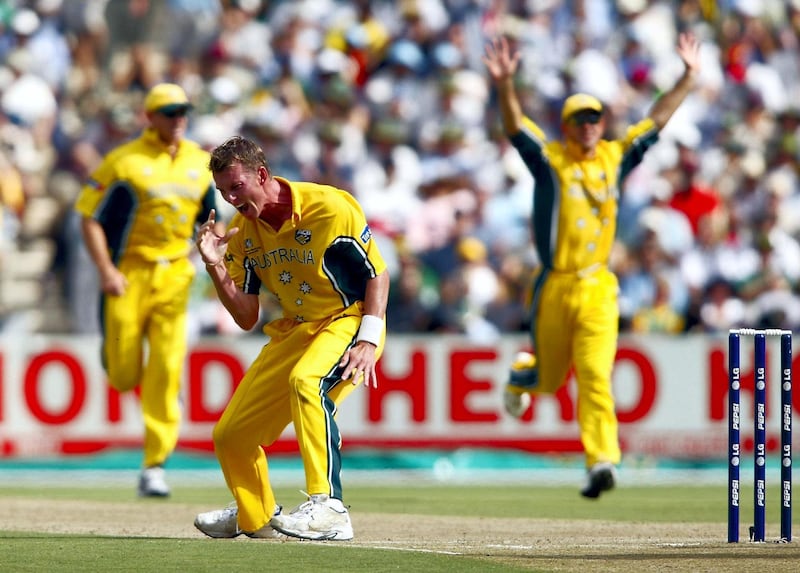 Fast Bowler Brett Lee (C) of Australia celebrates taking the wicket of Sourav Ganguly (not pictured) of India during the Final of The ICC Cricket World Cup at The Wanderers Stadium in Johannesburg 23 March 2003. AFP PHOTO Adrian DENNIS (Photo by ADRIAN DENNIS / AFP)