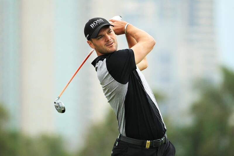 Martin Kaymer of Germany plays his second shot on the 13th hole. Getty Images