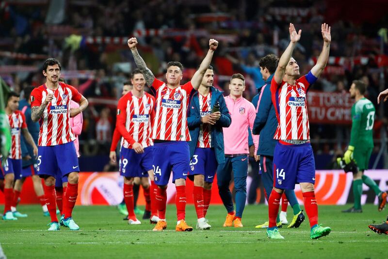 epa06709743 Atletico Madrid players celebrate after the UEFA Europa League semi final, second leg soccer match between Atletico Madrid and Arsenal FC at Metropolitano stadium in Madrid, Spain, 03 May 2018. Atletico won 2-1 on aggregate.  EPA/JUANJO MARTIN