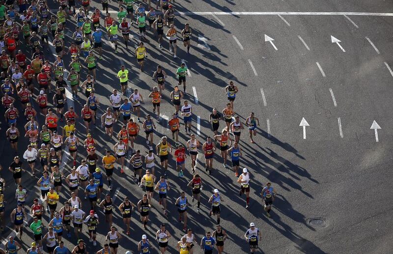 Runners compete in the 34th Barcelona Marathon race, northeastern Spain. A total of 17,830 runners from 87 countries took part in the race. Alberto Estevez / EPA