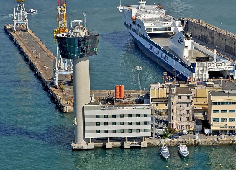 This undated photo made available Wednesday, May 8, 2013, shows the control tower of the port of Genoa, northern Italy, that collapsed after a cargo ship slammed into it killing at least three people, late Tuesday, May 7, 2013. A half-dozen people remain unaccounted for early Wednesday, after a cargo ship identified as the Jolly Nero of the Ignazio Messina & C. SpA Italian shipping line, slammed into the port. (AP Photo/ AR/Studio6/LaPresse) *** Local Caption ***  Italy Cargo Ship Crash.JPEG-0a939.jpg
