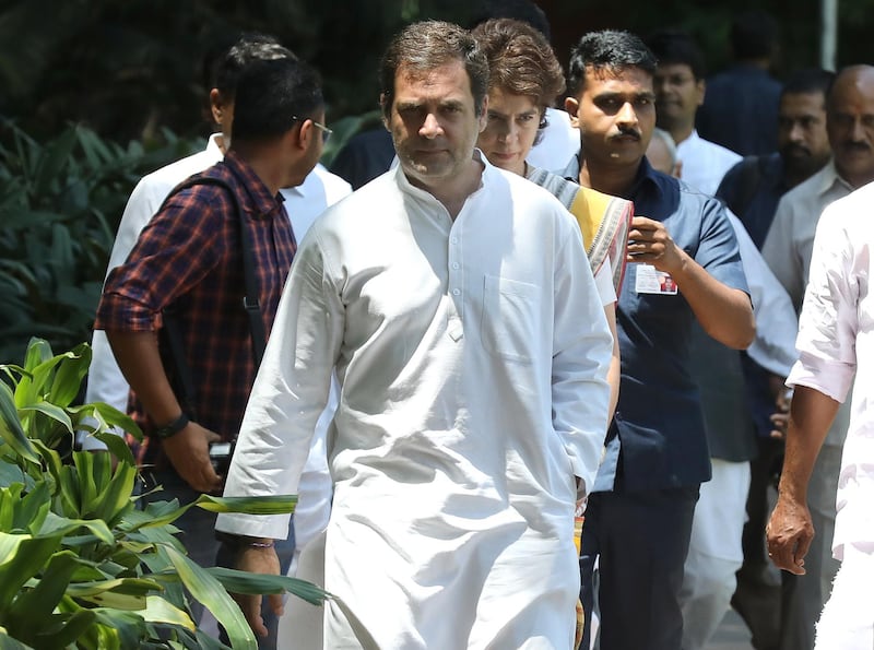 epa07691683 Indian National Congress Party President Rahul Gandhi (L) and Indian National Congress party member Priyanka Gandhi (C, back), the Congress general secretary and in charge of eastern Uttar Pradesh along with other senior leaders arrive to attend the Congress Working Committee (CWC) meeting, at the party's headquarters in New Delhi, India, 25 May 2019 (reissued 03 July 2019). Reports on  03 July 2019 state Rahul Gandhi has confirmed he has resigned as National Congress Party party president. Gandhi is said to have resigned out or moral responsibility for National Congress Party's bad performance in Lokh Sabha elections.  EPA/RAJAT GUPTA