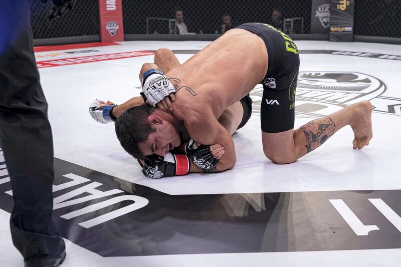 Marcos Costa has Abdelhakim Wahid on a submissive hold. Courtesy UAE Warriors