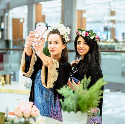 Attendees at a flower crown making workshop. Courtesy Turquoise Boutique Studio