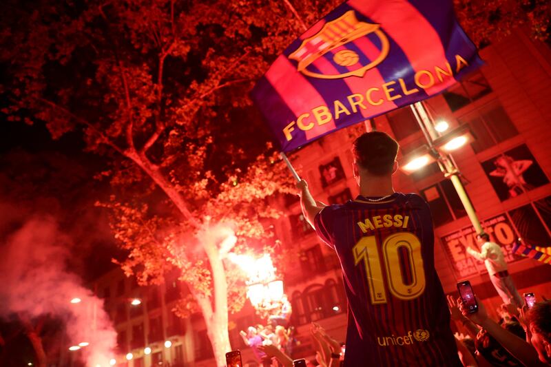 Barcelona fans celebrate in La Ramblas after their team's 4-2 win over Espanyol clinched the 2022/23 La Liga title. Reuters
