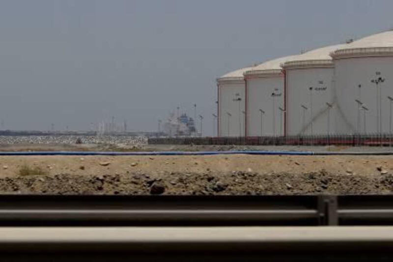 A ship docks at the refueling station in Fujairah, United Arab Emirates, Wednesday, May 30, 2012. The United Arab Emirates is nearing completion of a pipeline through the mountainous sheikdom of Fujairah that will allow it to reroute the bulk of its oil exports around the Strait of Hormuz at the mouth of the Gulf, the path for a fifth of the world's oil supply. (AP Photo/Kamran Jebreili) *** Local Caption ***  Mideast Emirates Pipeline.JPEG-00e3a.jpg