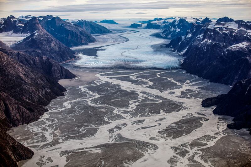The melting Sermeq glacier, about 80 kilometres south of Nuuk, is photographed in this aerial over Greenland on September 11, 2021. By Hannibal Hanschke, Pulitzer Prize finalist for Feature Photography. Reuters