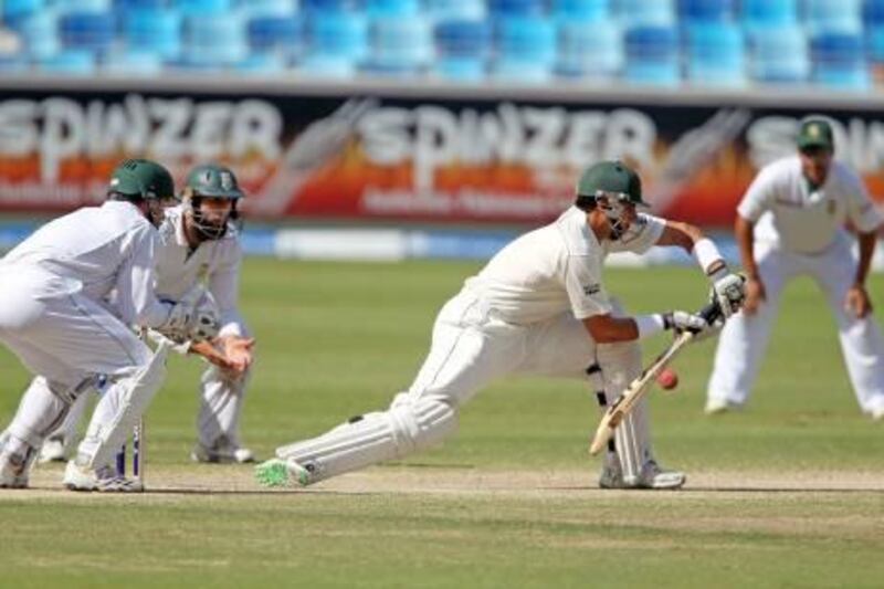 Pakistan's team captain Misbah Ul Haq plays a shot on the fifth day of their first cricket Test match against South Africa in Dubai on Tuesday, Nov. 16, 2010.  (AP Photo/Randi Sokoloff) *** Local Caption ***  LON112_Emirates_Pakistan_South_Africa_Cricket.jpg