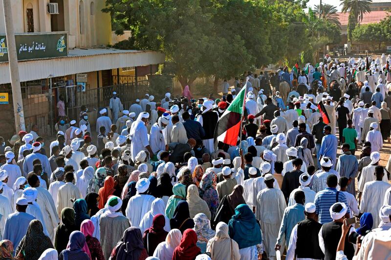 Sudanese mourners attend the funeral procession of Sudan's former prime minister and top opposition figure Sadiq al-Mahdi in Khartoum. AFP