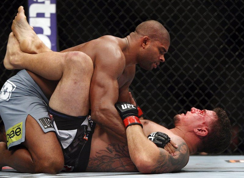 Frank Mir, bottom, and Alistair Overeem fight during their heavyweight bout on Saturday. Overeem won by unanimous decision. Tim Larsen / AP