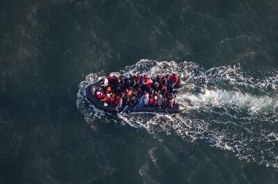 Migrants on a boat travelling from northern France to the UK. AFP

