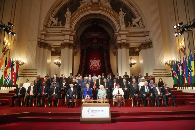 Commonwealth leaders pose for a family photograph with Britain's Queen Elizabeth II at the formal opening of the Commonwealth Heads of Government Meeting (CHOGM) at Buckingham Palace in London on April 19, 2018. The countries represented have been identified as: (back row, L-R) Barbados, Belize, St Vincent and The Grenadines, Malaysia, Tanzania, Zambia, Sierra Leone, Botswana, South Africa, Solomon Islands, Pakistan, The Bahamas, Mauritius, The Gambia. (second row from back, L-R) Ghana, Seychelles, St Lucia, Kiribati, Vanuatu, Jamaica, Canada, Australia, Trinidad and Tobago, Guyana, Lesotho, Namibia, St Kitts and Nevis, Mozambique. (second row from front row, L-R) Sri Lanka, Tonga, Fiji, Antigua and Barbuda, Malawi, India, Nigeria, Tuvalu, Nauru, Kenya, Cyprus, PNG, Cameroon, Bangladesh, New Zealand. (front row, L-R) Swaziland, Singapore, Dominica, Grenada, Malta, United Kingdom, Britain's Queen Elizabeth II, Commonwealth Secretary General Patricia Scotland, Rwanda, Samoa, Uganda, Brunei. 
Queen Elizabeth II, the Head of the Commonwealth opened the Commonwealth summit for what may be the last time today. / AFP PHOTO / POOL / Yui Mok