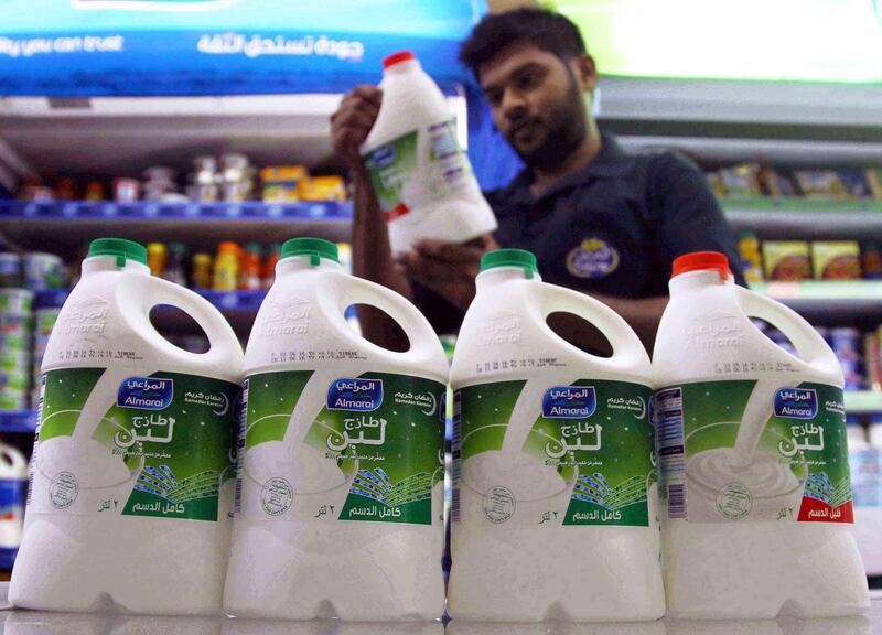 A man looks at a dairy product produced by Almarai at a grocery in Riyadh, Saudi Arabia June 2, 2016. REUTERS/Faisal Al Nasser  - S1AETIRYYYAA