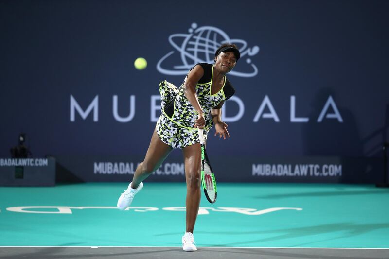 Venus plays a shot from the back of the court. Reuters