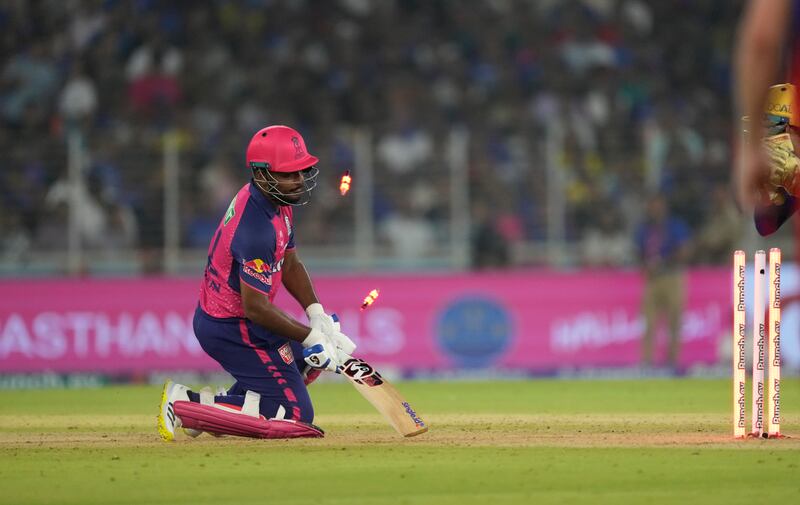 Rajasthan Royals' captain Sanju Samson reacts after he was stumped by Royal Challengers Bengaluru's wicketkeeper Dinesh Karthik for 17. AP 