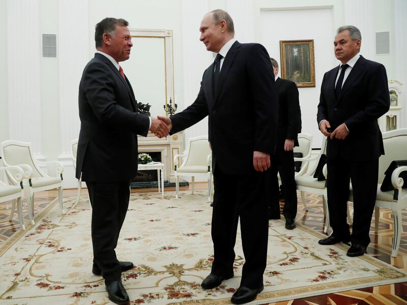 Russian President Vladimir Putin shakes hands with King Abdullah of Jordan during their meeting at the Kremlin in Moscow, Russia February 15, 2018. REUTERS/Sergei Chirikov/Pool