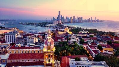 The old and new parts of Cartagena at sunset. Getty Images