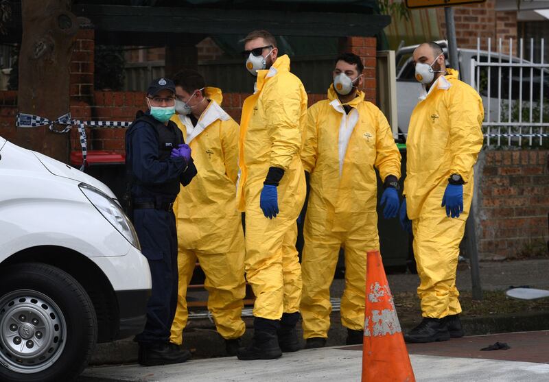 Police prepare to search for evidence at a block of flats in the Sydney suburb of Lakemba on after counter-terrorism raids across the city at the weekend. William West.